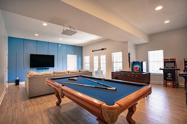 game room with baseboards, french doors, wood finished floors, and recessed lighting