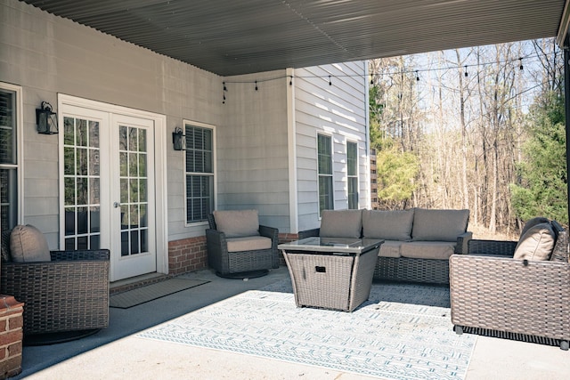 view of patio with french doors and an outdoor living space