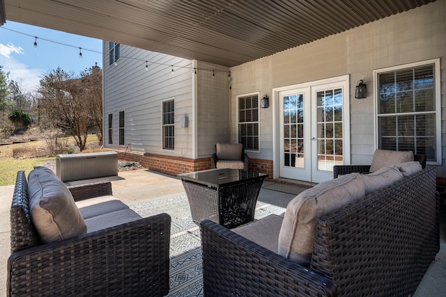 view of patio with french doors and outdoor lounge area