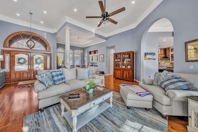20 Waverly Ct, Moneta, VA 24121 - living area with baseboards, recessed lighting, ceiling fan with notable chandelier, wood finished floors, and arched walkways