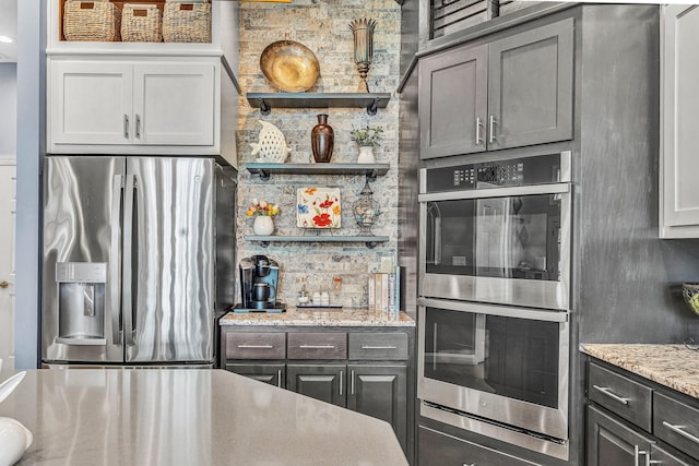 20 Waverly Ct, Moneta, VA 24121 - kitchen with open shelves, stainless steel appliances, and light stone counters