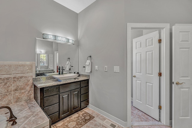 20 Waverly Ct, Moneta, VA 24121 - full bathroom with visible vents, baseboards, a high ceiling, and vanity