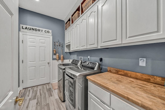 20 Waverly Ct, Moneta, VA 24121 - washroom with light wood finished floors, cabinet space, and separate washer and dryer