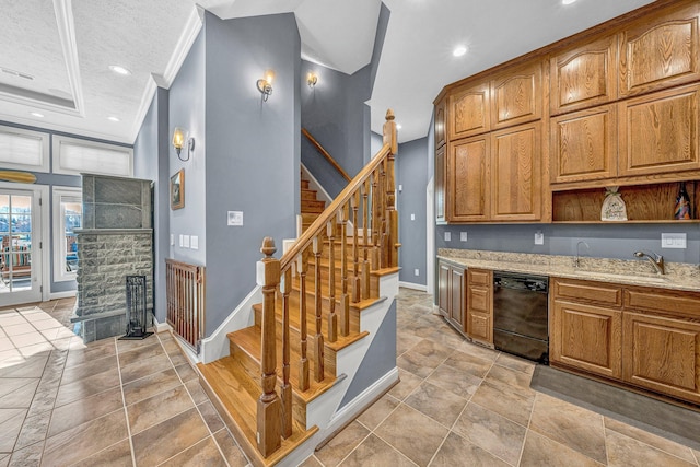 20 Waverly Ct, Moneta, VA 24121 - kitchen featuring crown molding, baseboards, black dishwasher, light stone counters, and a sink