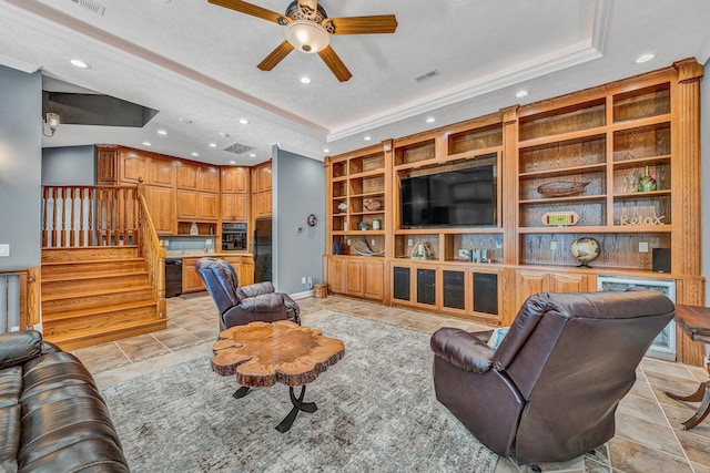 20 Waverly Ct, Moneta, VA 24121 - living area with built in shelves, ceiling fan, stairway, a tray ceiling, and recessed lighting