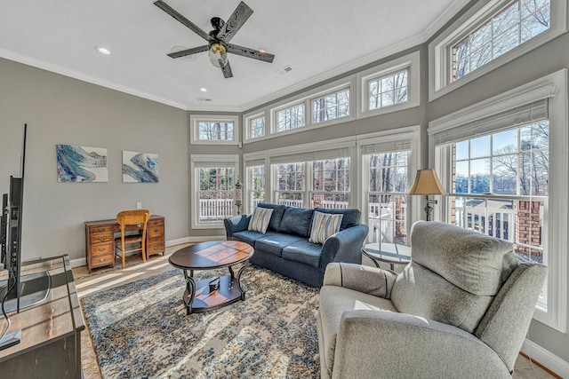 20 Waverly Ct, Moneta, VA 24121 - living room featuring baseboards, ceiling fan, ornamental molding, a towering ceiling, and wood finished floors