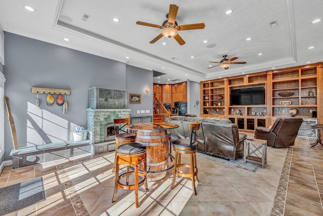 20 Waverly Ct, Moneta, VA 24121 - living area with a raised ceiling, built in shelves, a fireplace, and recessed lighting
