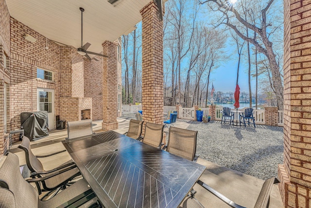 20 Waverly Ct, Moneta, VA 24121 - view of patio / terrace featuring area for grilling, outdoor dining area, and a ceiling fan