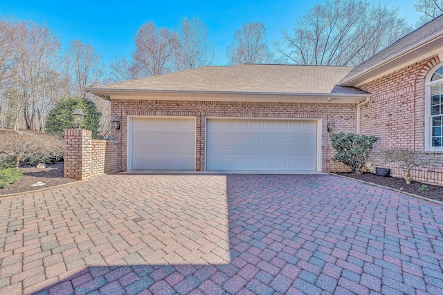 20 Waverly Ct, Moneta, VA 24121 - garage featuring decorative driveway