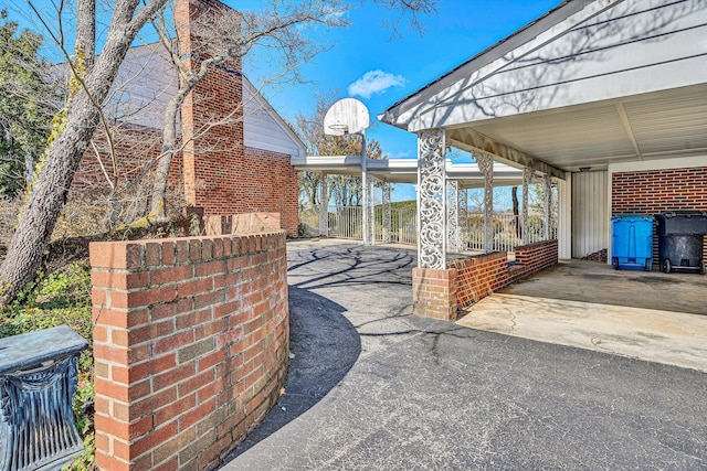 view of patio featuring a carport