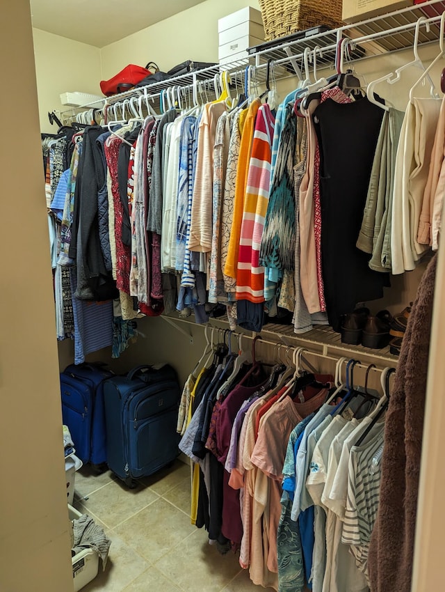 walk in closet featuring tile patterned floors