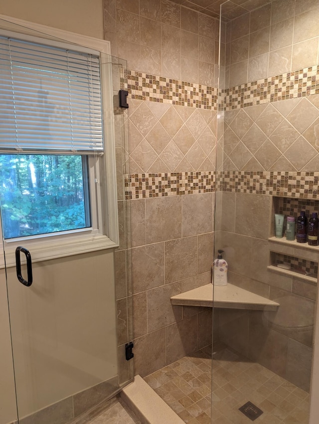 full bathroom with a stall shower