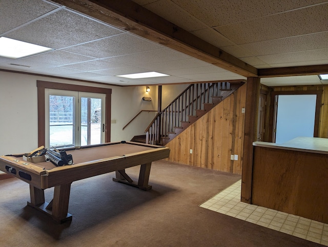 playroom with carpet floors, wood walls, a drop ceiling, and pool table