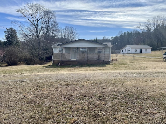 view of front facade with a porch and a front yard