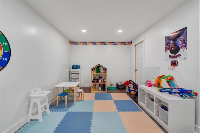 game room with recessed lighting and baseboards