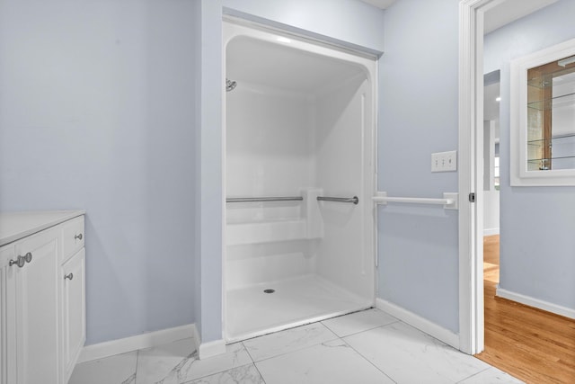 47 Westover Rd, Rocky Mount, VA 24151 - bathroom featuring marble finish floor, a shower, vanity, and baseboards