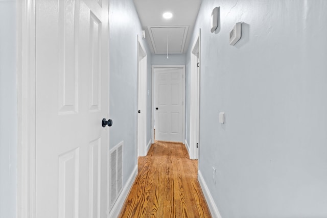 47 Westover Rd, Rocky Mount, VA 24151 - hallway with baseboards, attic access, visible vents, and wood finished floors