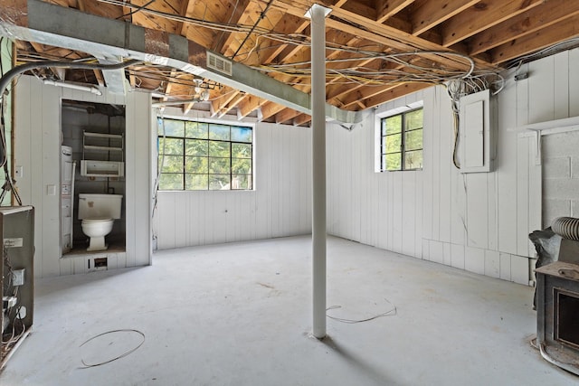 47 Westover Rd, Rocky Mount, VA 24151 - below grade area featuring a wealth of natural light, electric panel, visible vents, and water heater