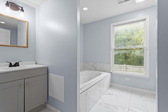 47 Westover Rd, Rocky Mount, VA 24151 - full bathroom featuring marble finish floor, a garden tub, visible vents, vanity, and baseboards