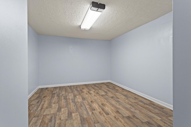 47 Westover Rd, Rocky Mount, VA 24151 - unfurnished room featuring a textured ceiling, wood finished floors, and baseboards