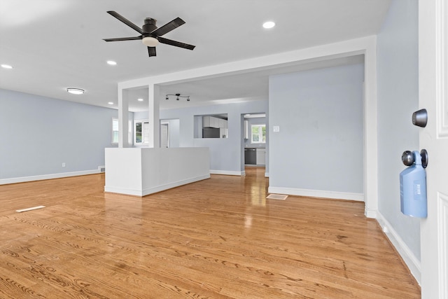 47 Westover Rd, Rocky Mount, VA 24151 - unfurnished living room featuring baseboards, a ceiling fan, and light wood-style floors