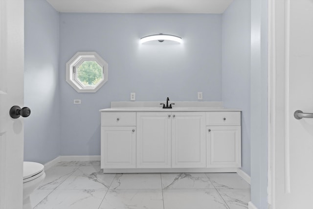 47 Westover Rd, Rocky Mount, VA 24151 - bathroom with marble finish floor, vanity, toilet, and baseboards