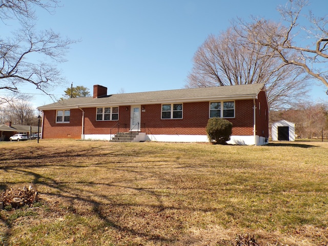 ranch-style home featuring entry steps, brick siding, a chimney, and a front yard