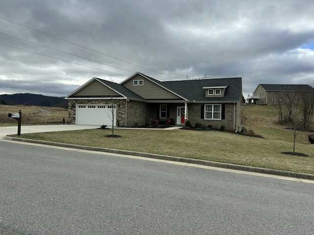 view of front of home featuring a garage, driveway, a front lawn, and brick siding