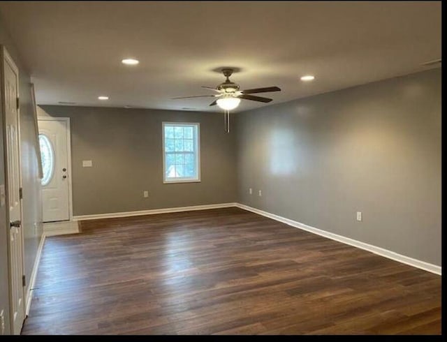 interior space featuring ceiling fan, recessed lighting, dark wood finished floors, and baseboards