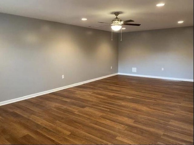 unfurnished room featuring ceiling fan, dark wood-style flooring, recessed lighting, and baseboards