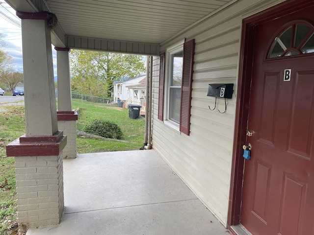 property entrance with a porch