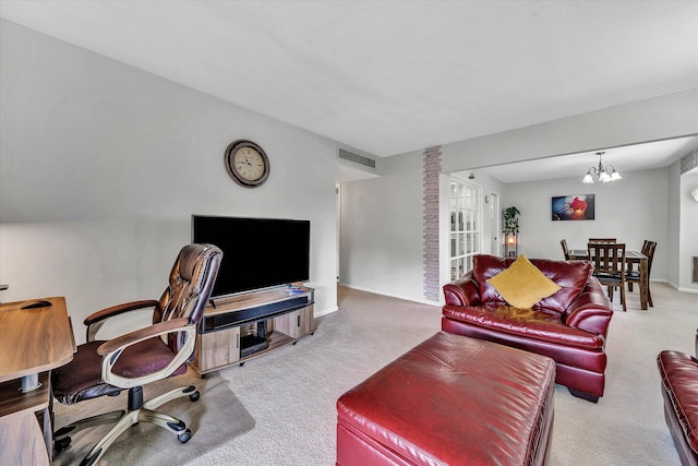 carpeted office space with visible vents, baseboards, and an inviting chandelier