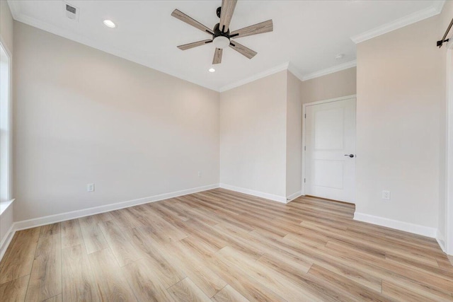 spare room featuring baseboards, light wood-type flooring, recessed lighting, a ceiling fan, and crown molding