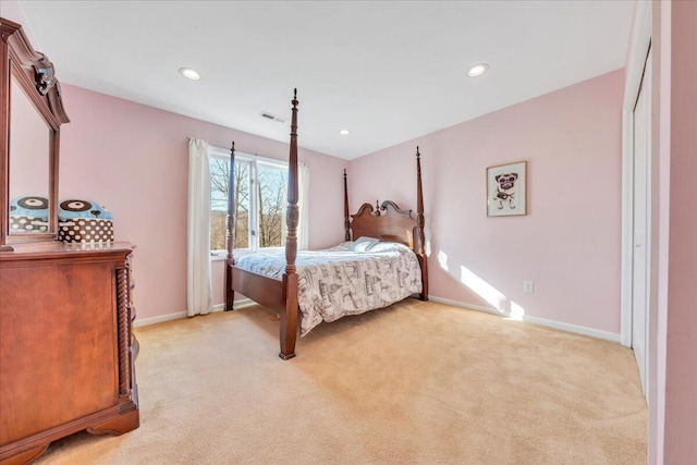 bedroom with recessed lighting, light colored carpet, visible vents, and baseboards