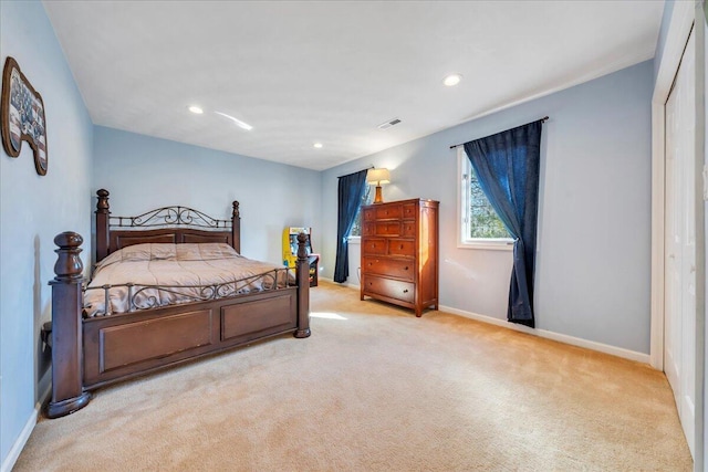 carpeted bedroom with recessed lighting and baseboards