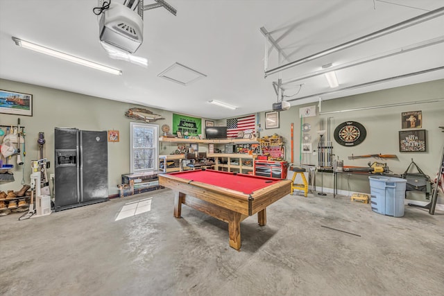 game room with a garage, concrete floors, and billiards