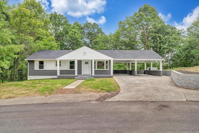 4438 Stonewall Rd NW, Roanoke, VA 24017 - view of front of property featuring concrete driveway, a carport, a shingled roof, and a front yard