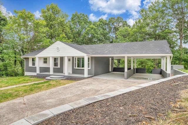 4438 Stonewall Rd NW, Roanoke, VA 24017 - ranch-style home with driveway, an attached carport, covered porch, and a shingled roof
