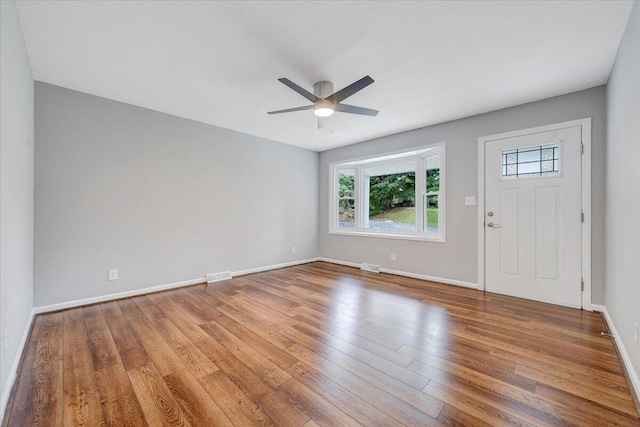 4438 Stonewall Rd NW, Roanoke, VA 24017 - entrance foyer featuring ceiling fan, wood finished floors, and baseboards