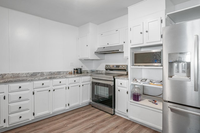 kitchen with under cabinet range hood, light wood-style floors, white cabinets, appliances with stainless steel finishes, and light stone countertops