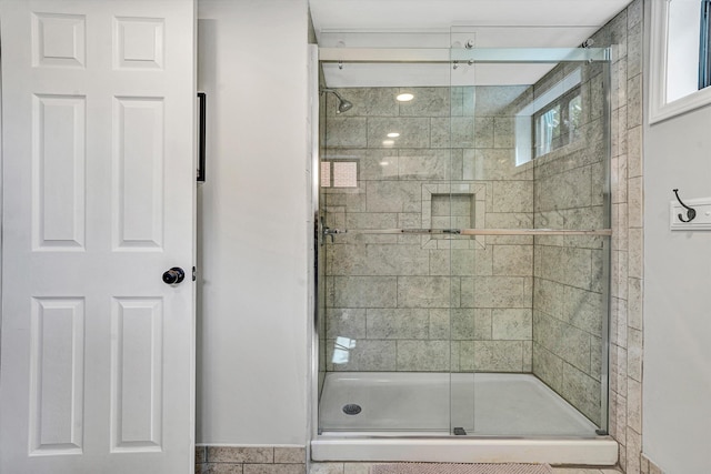 full bath featuring a stall shower