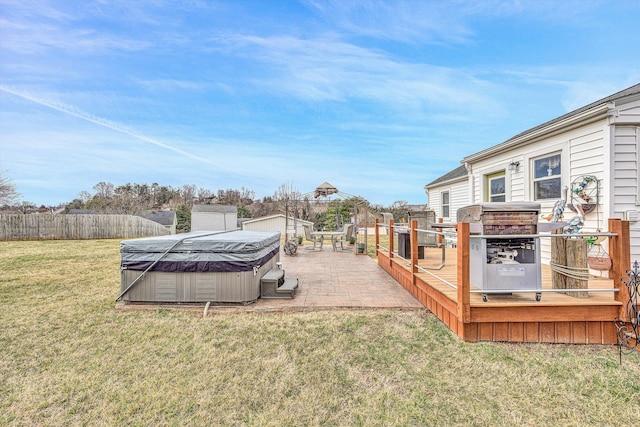 view of yard with a patio area, fence, a hot tub, and a gazebo