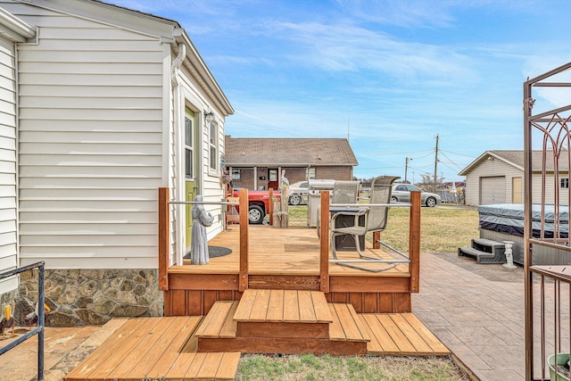 wooden deck featuring a patio area