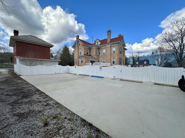 exterior space with a gate and fence