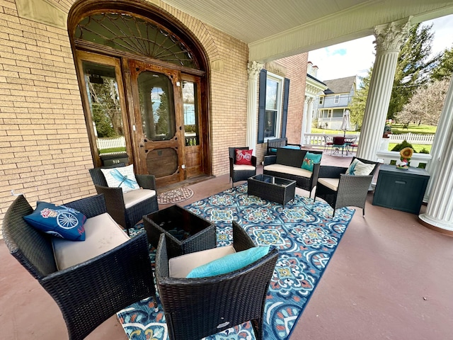 view of patio / terrace featuring covered porch and outdoor lounge area