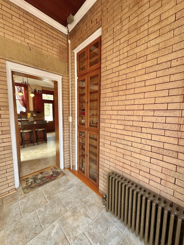 doorway to property featuring french doors and radiator