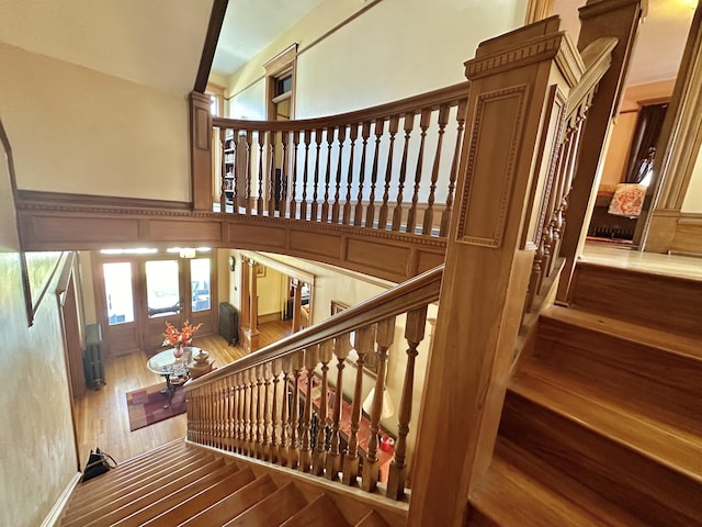 stairway with wood-type flooring