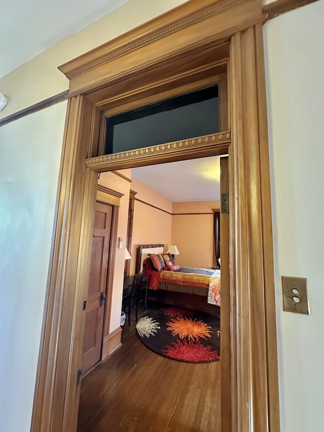 bedroom with wood finished floors