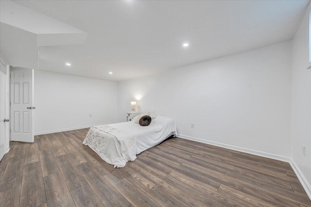 bedroom featuring recessed lighting, baseboards, and dark wood-style floors