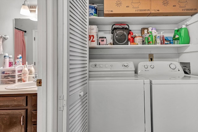 clothes washing area with laundry area and separate washer and dryer